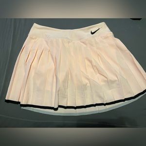 Small Nike Tennis skirt pink color in great used condition!